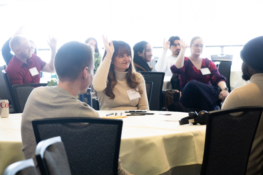 Students raising hands